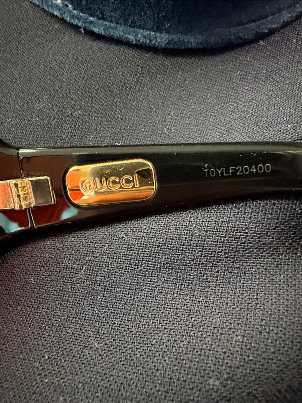 Gucci Men's Black Frames with Gold Logo Plaque